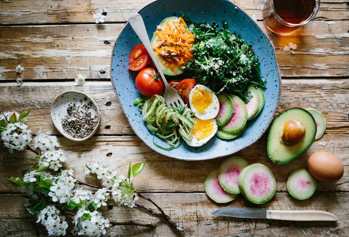 A colorful, healthy buddha bowl with fresh vegetables